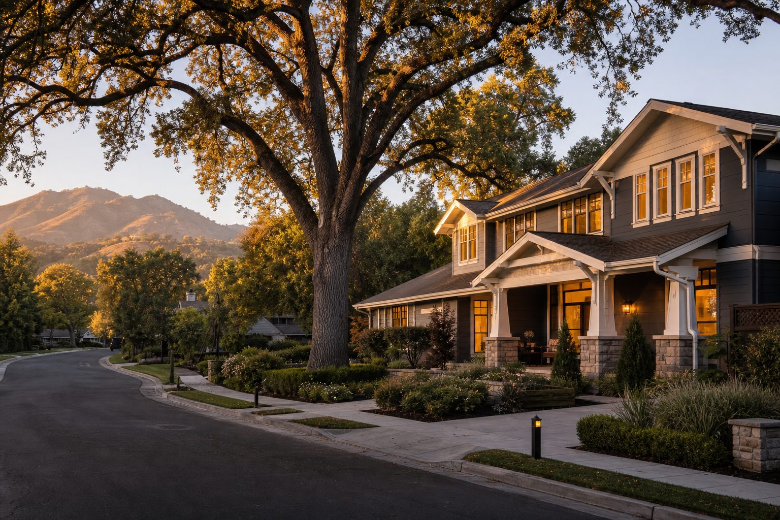 Tree-lined Walnut Creek street with an upscale two-story home at golden hour